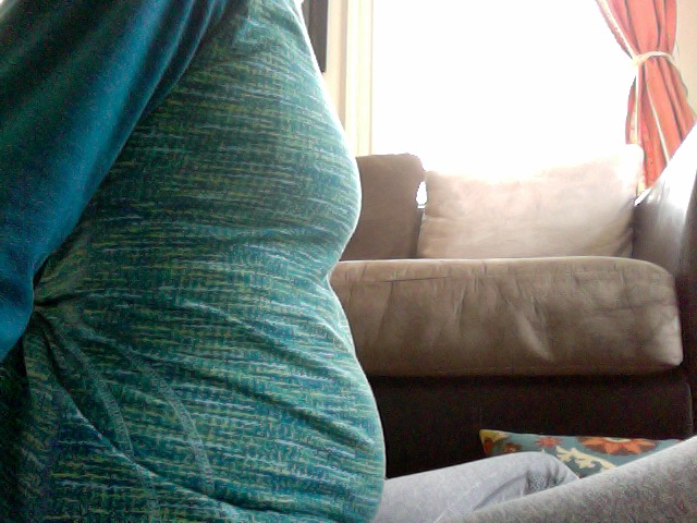 Breathing. Firstborn asked, "Mommy, you have another baby in there?" No. That's called no abs.