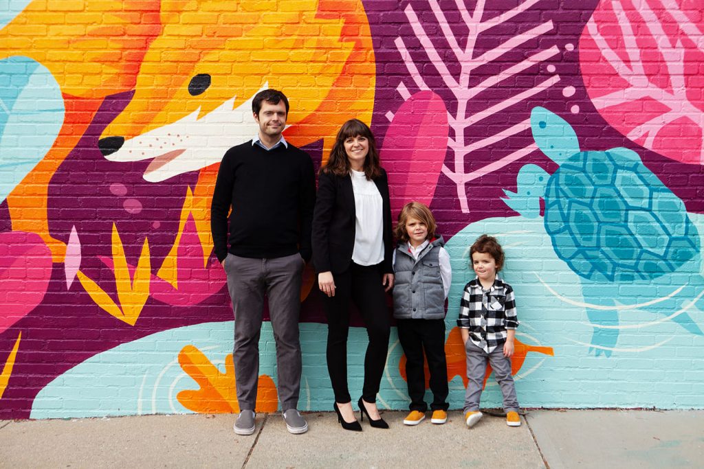 family near street art, boston