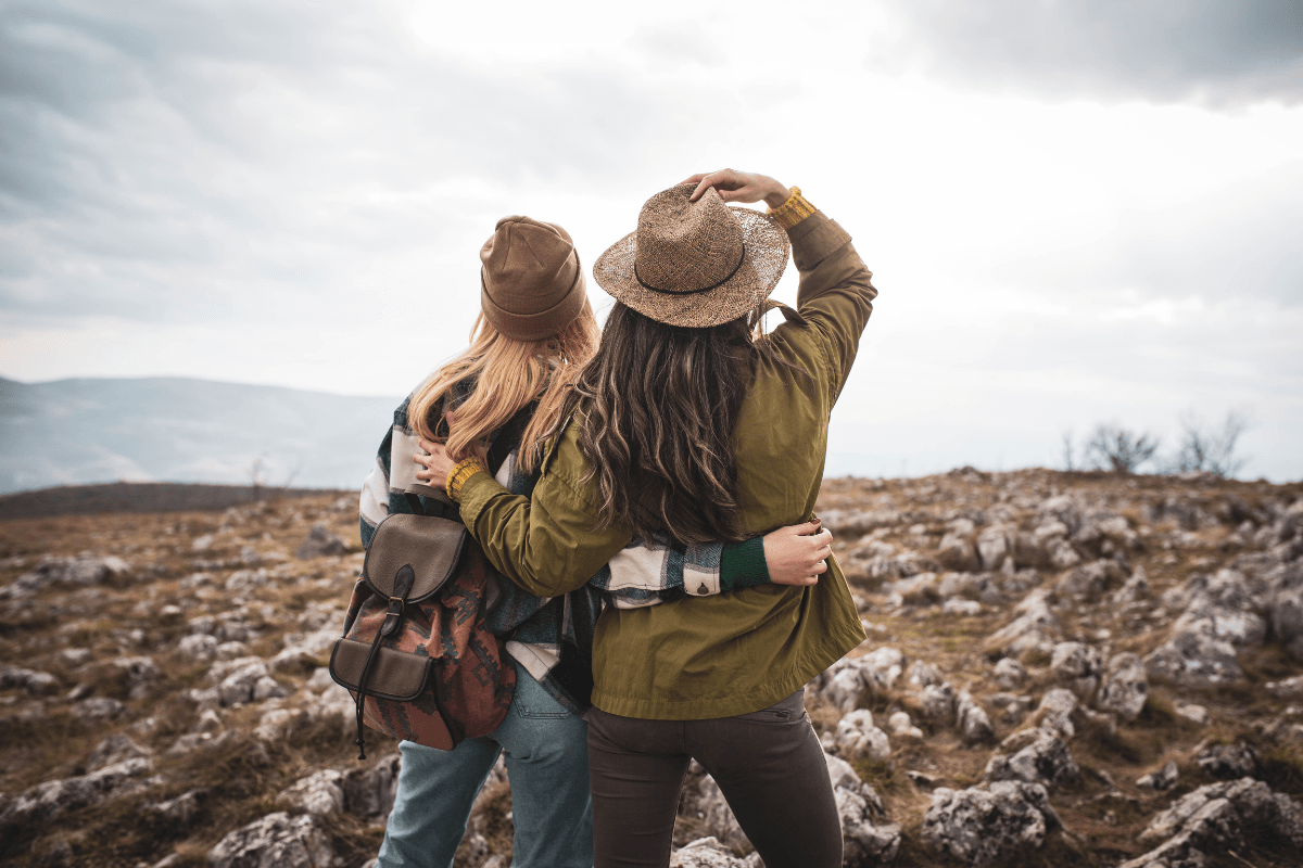 two women hiking, showing an idea for a friend date without drinks