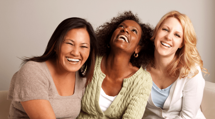 diverse group of women laughing together