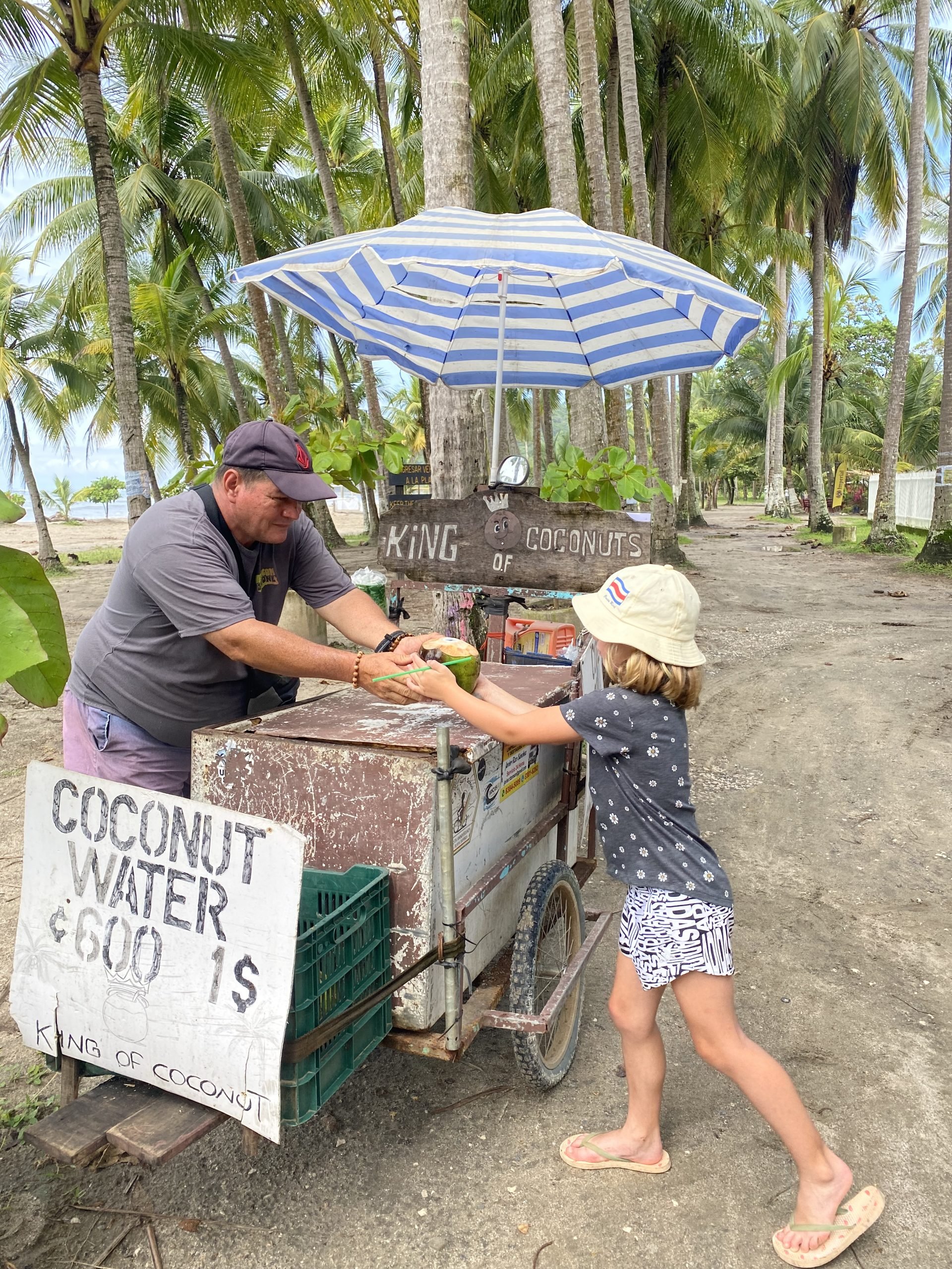 Buying a coconut water from a local vendor