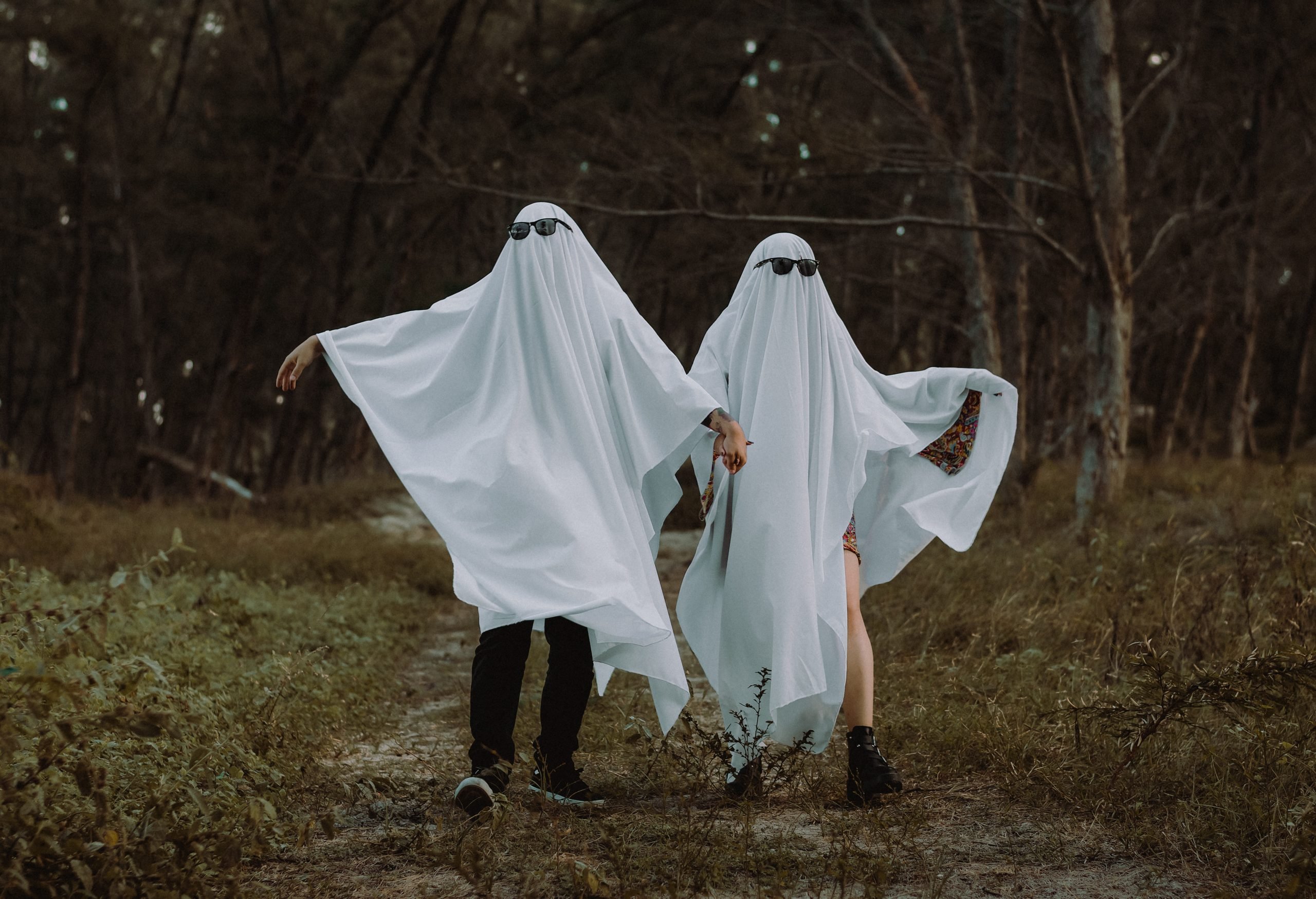 couple wearing ghost costumes (Boo! Favorite Spots Near Boston for a Haunted Date Night)