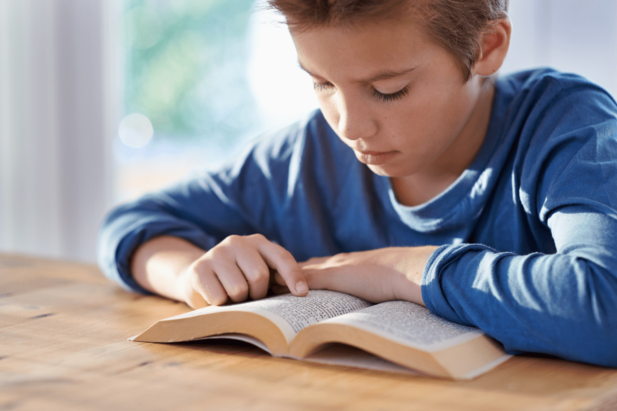 tween or middle school child reading a book (how to get middle schooler to read)