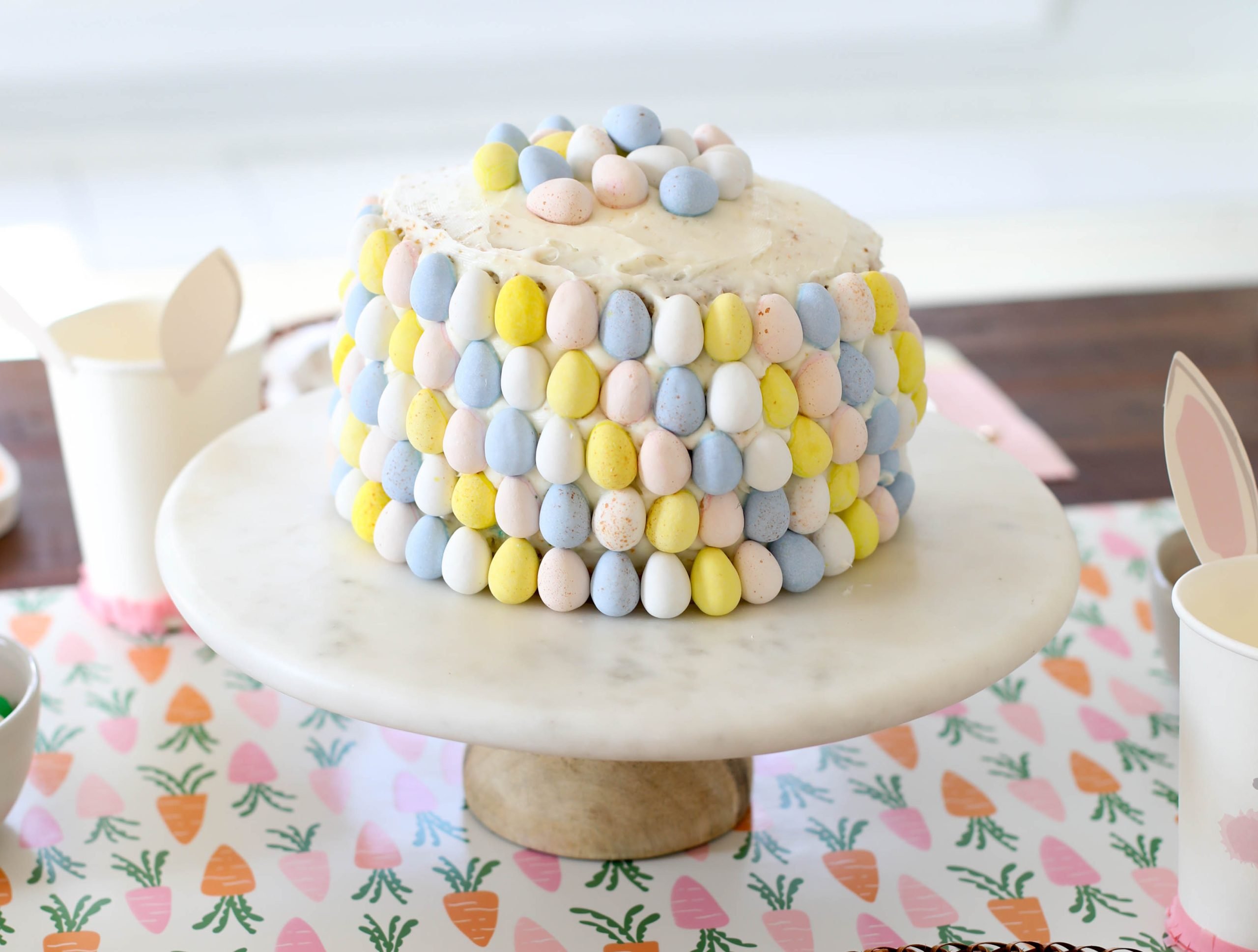 Cake decorated with Cadbury Eggs on an Easter table