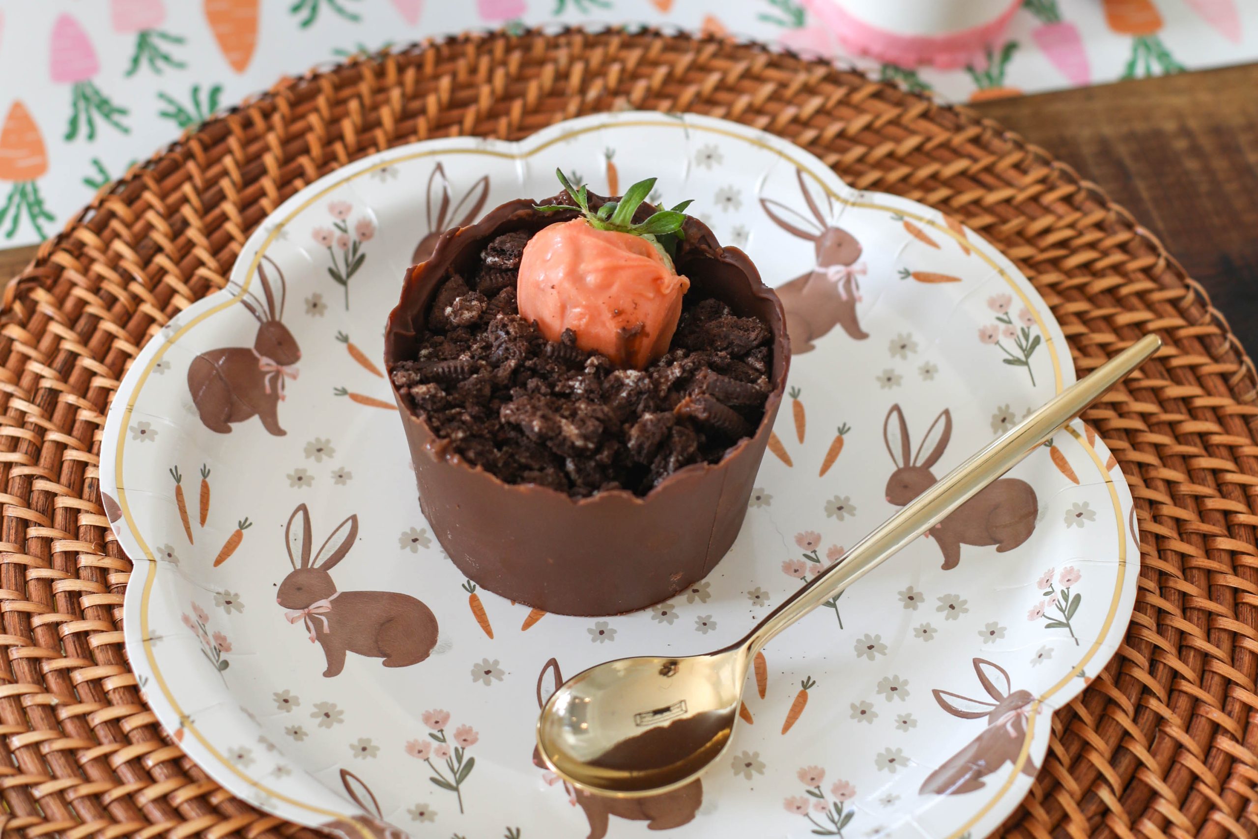 a chocolate dessert cup on an Easter paper plate